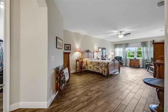 6008 Apex Way, Lady Lake, FL 32159 - bedroom with wood finished floors, baseboards, and a ceiling fan