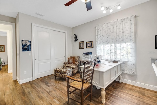 6008 Apex Way, Lady Lake, FL 32159 - office area featuring ceiling fan, wood finished floors, and baseboards