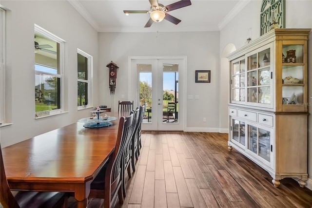6008 Apex Way, Lady Lake, FL 32159 - dining room with ceiling fan, french doors, wood finished floors, ornamental molding, and baseboards