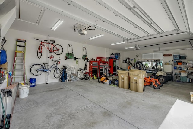 6008 Apex Way, Lady Lake, FL 32159 - garage with a garage door opener