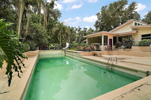27113 Robertson Rd, Yalaha, FL 34797 - outdoor pool with a water slide
