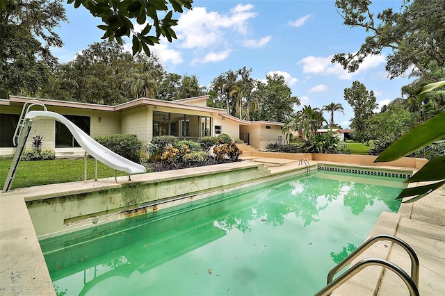 27113 Robertson Rd, Yalaha, FL 34797 - swimming pool with a water slide