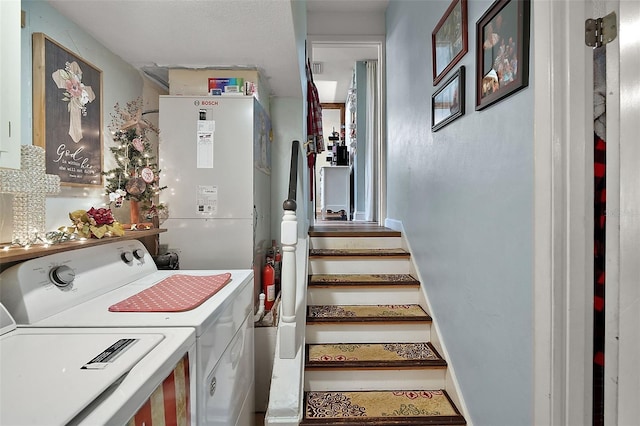 27212 Orange Ave, Yalaha, FL 34797 - washroom featuring washing machine and dryer and heating unit