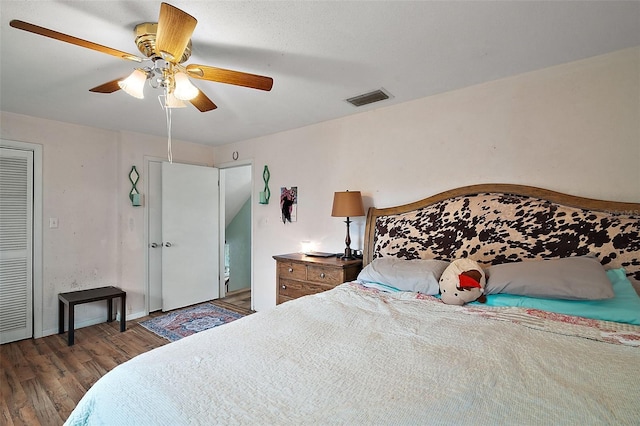 27212 Orange Ave, Yalaha, FL 34797 - bedroom featuring wood finished floors and ceiling fan