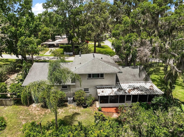 27212 Orange Ave, Yalaha, FL 34797 - view of subject property featuring a tree filled landscape