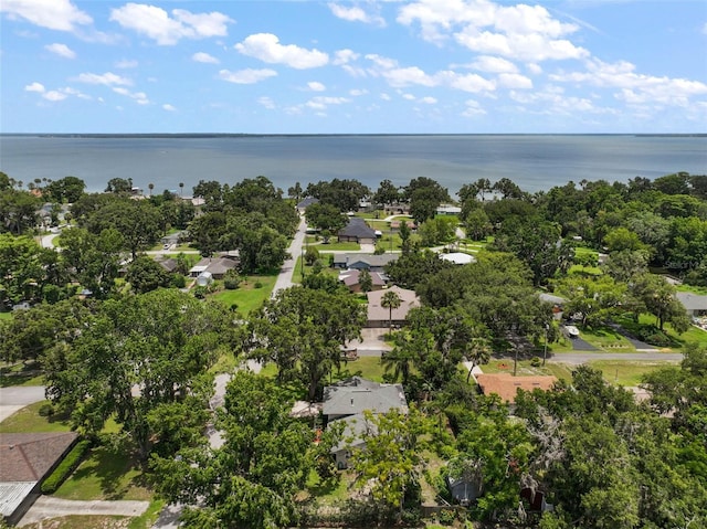 27212 Orange Ave, Yalaha, FL 34797 - aerial perspective of suburban area featuring a large body of water and a tree filled landscape