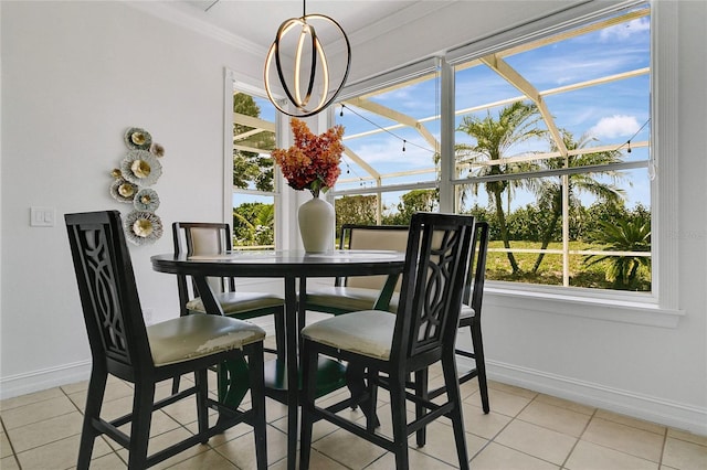 17300 Summer Sun Ct, Clermont, FL 34711 - dining space with baseboards, ornamental molding, and light tile patterned flooring