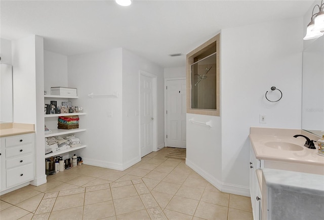 17300 Summer Sun Ct, Clermont, FL 34711 - full bathroom with tile patterned flooring, a shower, baseboards, and vanity