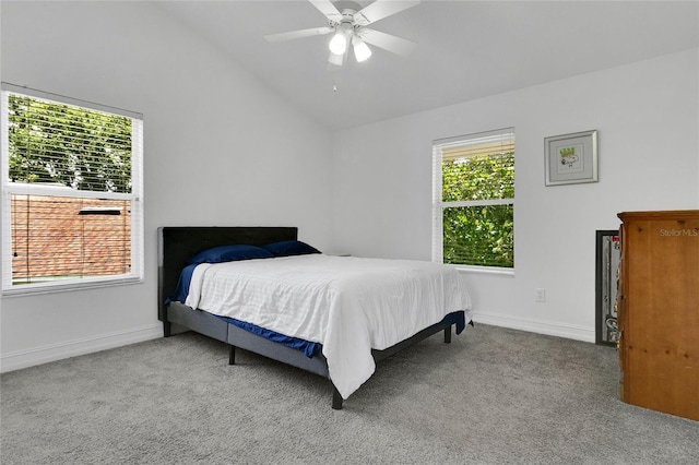17300 Summer Sun Ct, Clermont, FL 34711 - carpeted bedroom featuring lofted ceiling, baseboards, and a ceiling fan