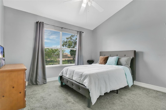 17300 Summer Sun Ct, Clermont, FL 34711 - carpeted bedroom with baseboards, vaulted ceiling, and ceiling fan