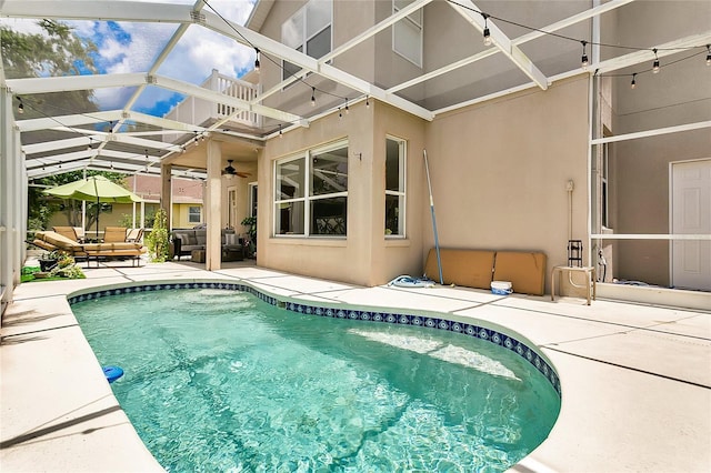 17300 Summer Sun Ct, Clermont, FL 34711 - swimming pool with an outdoor hangout area, a patio, ceiling fan, and glass enclosure