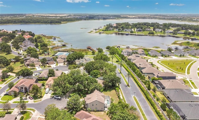 17300 Summer Sun Ct, Clermont, FL 34711 - aerial overview of property's location with nearby suburban area and a nearby body of water