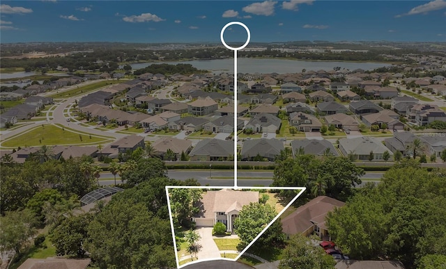 17300 Summer Sun Ct, Clermont, FL 34711 - aerial perspective of suburban area with a large body of water and property boundaries highlighted