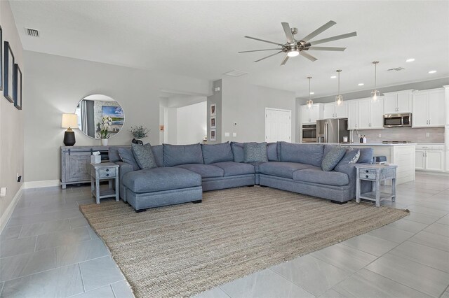 391 Cheeota Ct, Minneola, FL 34715 - living area with a ceiling fan, recessed lighting, and light tile patterned flooring