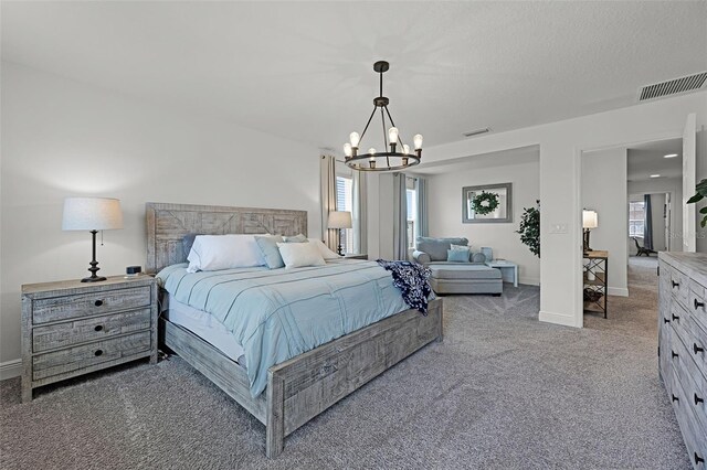 391 Cheeota Ct, Minneola, FL 34715 - bedroom with carpet and a chandelier