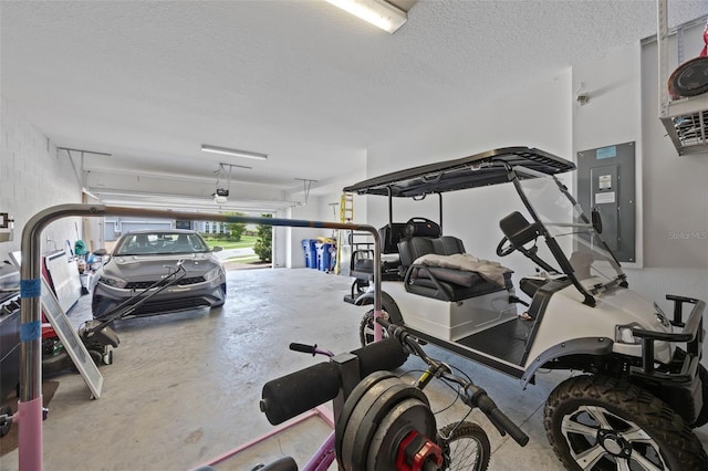 391 Cheeota Ct, Minneola, FL 34715 - garage with electric panel and a garage door opener