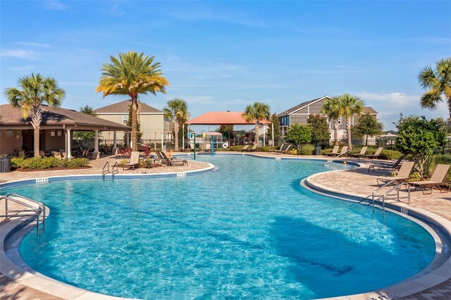 391 Cheeota Ct, Minneola, FL 34715 - community pool with a patio area