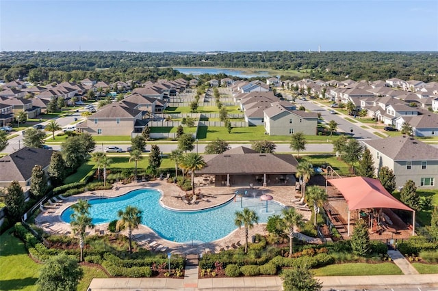 391 Cheeota Ct, Minneola, FL 34715 - aerial perspective of suburban area with a pool area