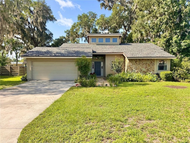 3664 SE 45th Pl, Ocala, FL 34480 - mid-century modern home with an attached garage, concrete driveway, roof with shingles, and stone siding
