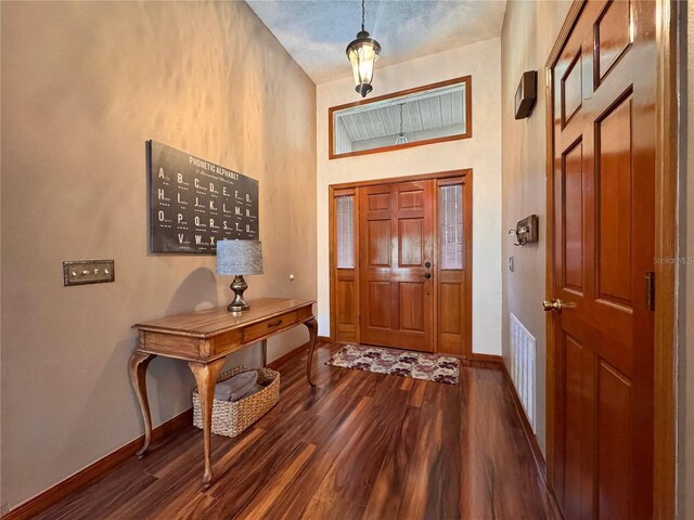 3664 SE 45th Pl, Ocala, FL 34480 - foyer entrance with dark wood-style flooring