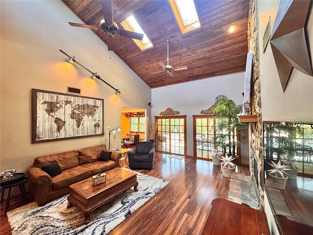 3664 SE 45th Pl, Ocala, FL 34480 - living room with a ceiling fan, high vaulted ceiling, wooden ceiling, wood finished floors, and a skylight