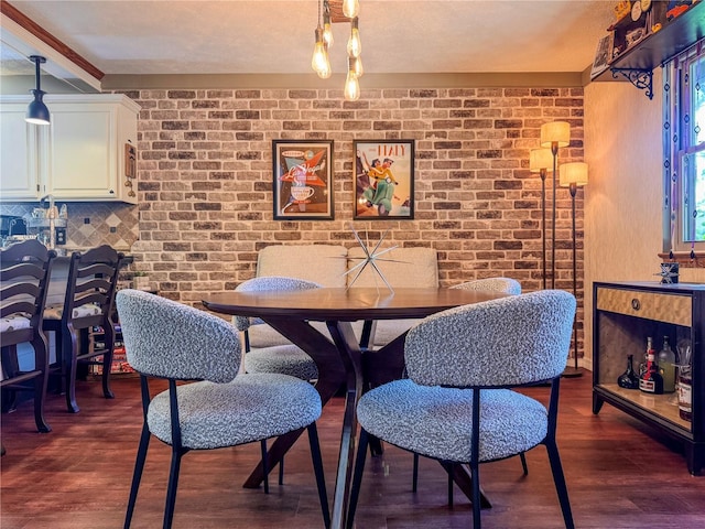 3664 SE 45th Pl, Ocala, FL 34480 - dining area with dark wood-style flooring and brick wall