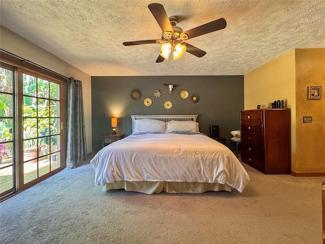 3664 SE 45th Pl, Ocala, FL 34480 - bedroom featuring carpet floors, access to outside, a textured ceiling, and ceiling fan