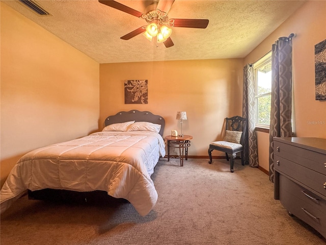 3664 SE 45th Pl, Ocala, FL 34480 - bedroom featuring a textured ceiling, light colored carpet, and ceiling fan