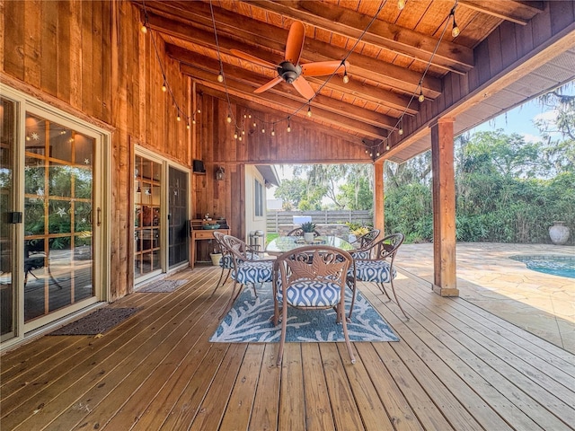 3664 SE 45th Pl, Ocala, FL 34480 - wooden terrace featuring outdoor dining area, a ceiling fan, and an outdoor pool