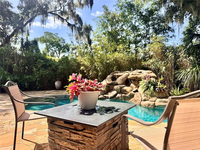 3664 SE 45th Pl, Ocala, FL 34480 - view of swimming pool with a patio area