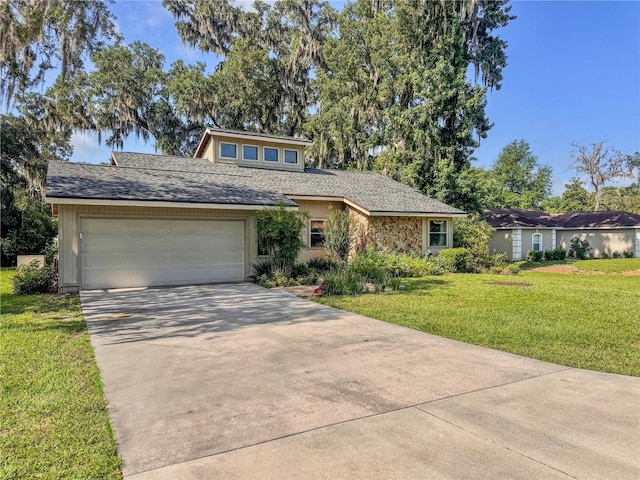 3664 SE 45th Pl, Ocala, FL 34480 - mid-century home featuring concrete driveway, a garage, a front yard, and roof with shingles