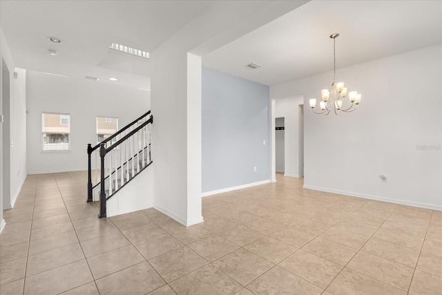 752 Sandy Bar Dr, Winter Garden, FL 34787 - spare room featuring light tile patterned floors, a chandelier, and stairway