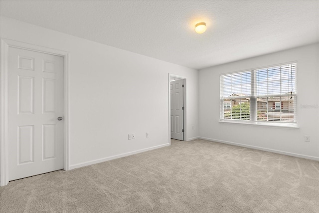 752 Sandy Bar Dr, Winter Garden, FL 34787 - unfurnished room with carpet floors and a textured ceiling
