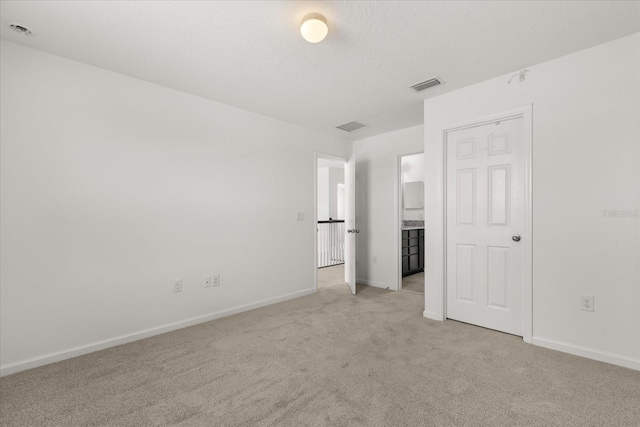752 Sandy Bar Dr, Winter Garden, FL 34787 - unfurnished bedroom with light colored carpet and baseboards