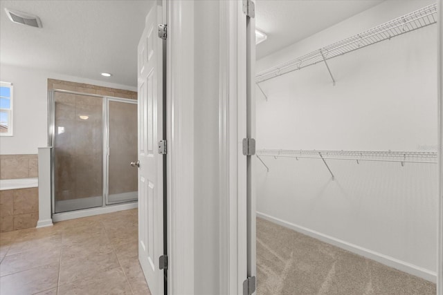 752 Sandy Bar Dr, Winter Garden, FL 34787 - spacious closet with light tile patterned floors