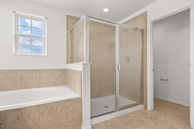 752 Sandy Bar Dr, Winter Garden, FL 34787 - bathroom featuring a stall shower, a garden tub, tile patterned flooring, and recessed lighting
