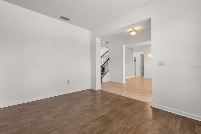 752 Sandy Bar Dr, Winter Garden, FL 34787 - unfurnished room with stairs and wood finished floors