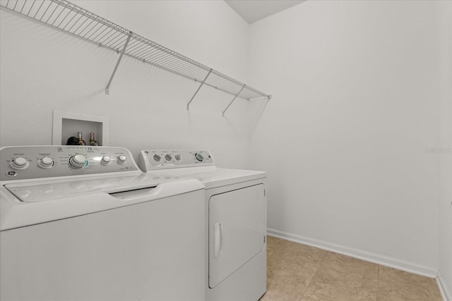 752 Sandy Bar Dr, Winter Garden, FL 34787 - washroom featuring washing machine and dryer and light tile patterned flooring