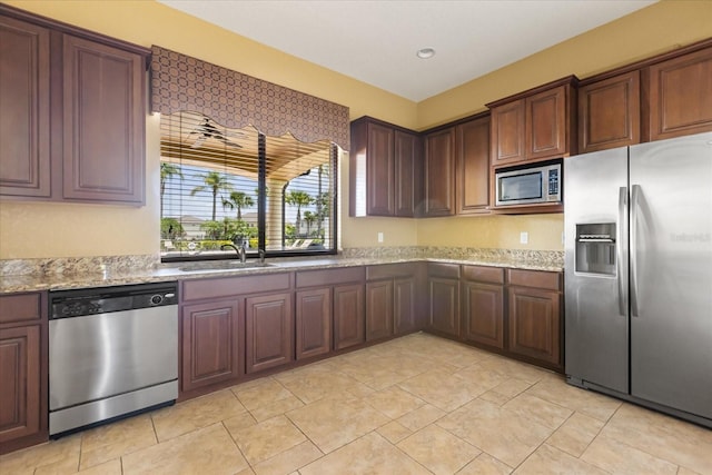 752 Sandy Bar Dr, Winter Garden, FL 34787 - kitchen with stainless steel appliances and light stone countertops