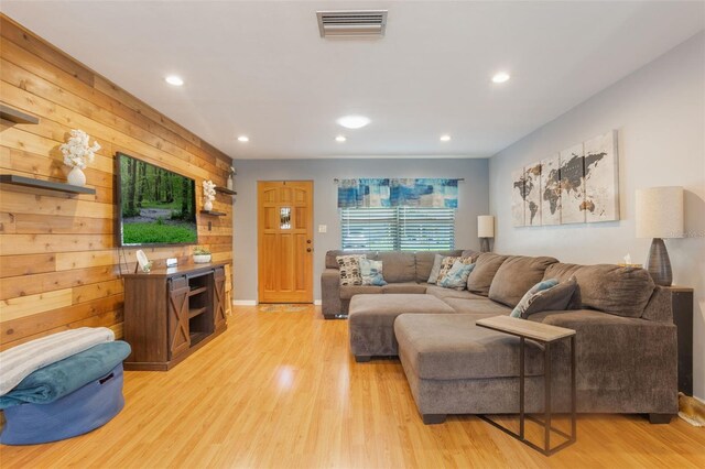 11750 Watts Ct, Tavares, FL 32778 - living room featuring light wood-style floors and recessed lighting