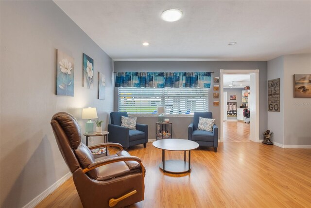 11750 Watts Ct, Tavares, FL 32778 - sitting room with wood finished floors and recessed lighting