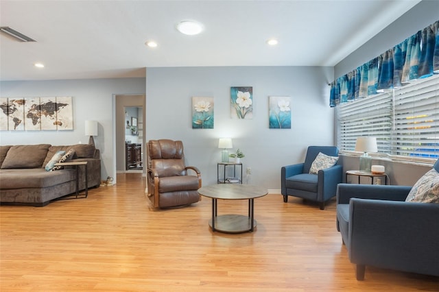 11750 Watts Ct, Tavares, FL 32778 - living area with light wood-style floors and recessed lighting