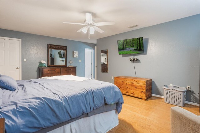 11750 Watts Ct, Tavares, FL 32778 - bedroom featuring light wood-style floors and ceiling fan