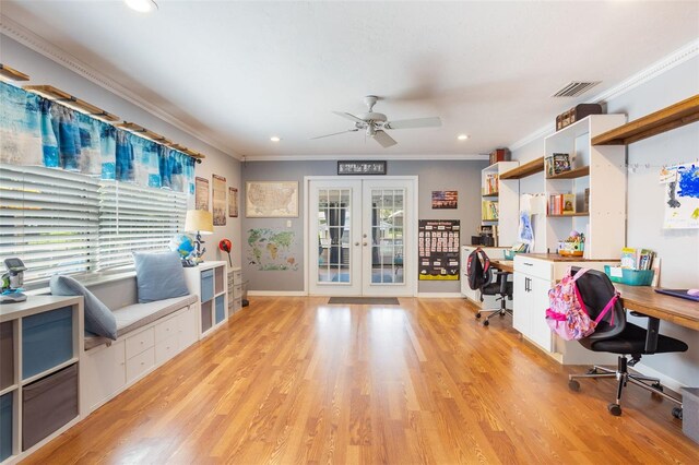 11750 Watts Ct, Tavares, FL 32778 - home office with french doors, healthy amount of natural light, ceiling fan, crown molding, and light wood finished floors