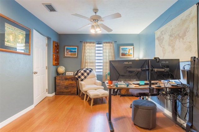 11750 Watts Ct, Tavares, FL 32778 - office area featuring wood finished floors and ceiling fan