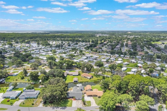 11750 Watts Ct, Tavares, FL 32778 - aerial overview of property's location featuring nearby suburban area and a nearby body of water