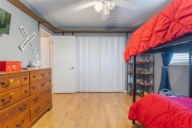 11750 Watts Ct, Tavares, FL 32778 - bedroom with light wood finished floors and ceiling fan