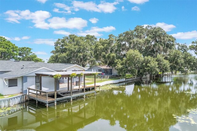 11750 Watts Ct, Tavares, FL 32778 - dock area featuring boat lift and a water view