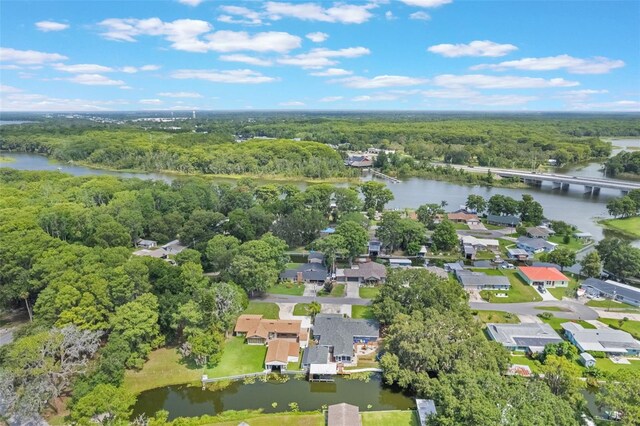 11750 Watts Ct, Tavares, FL 32778 - aerial overview of property's location with a forest and a nearby body of water