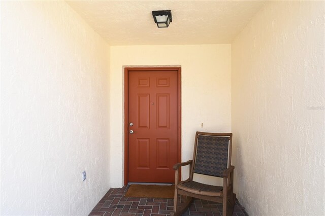 1325 Balboa Ct, The Villages, FL 32159 - property entrance featuring stucco siding